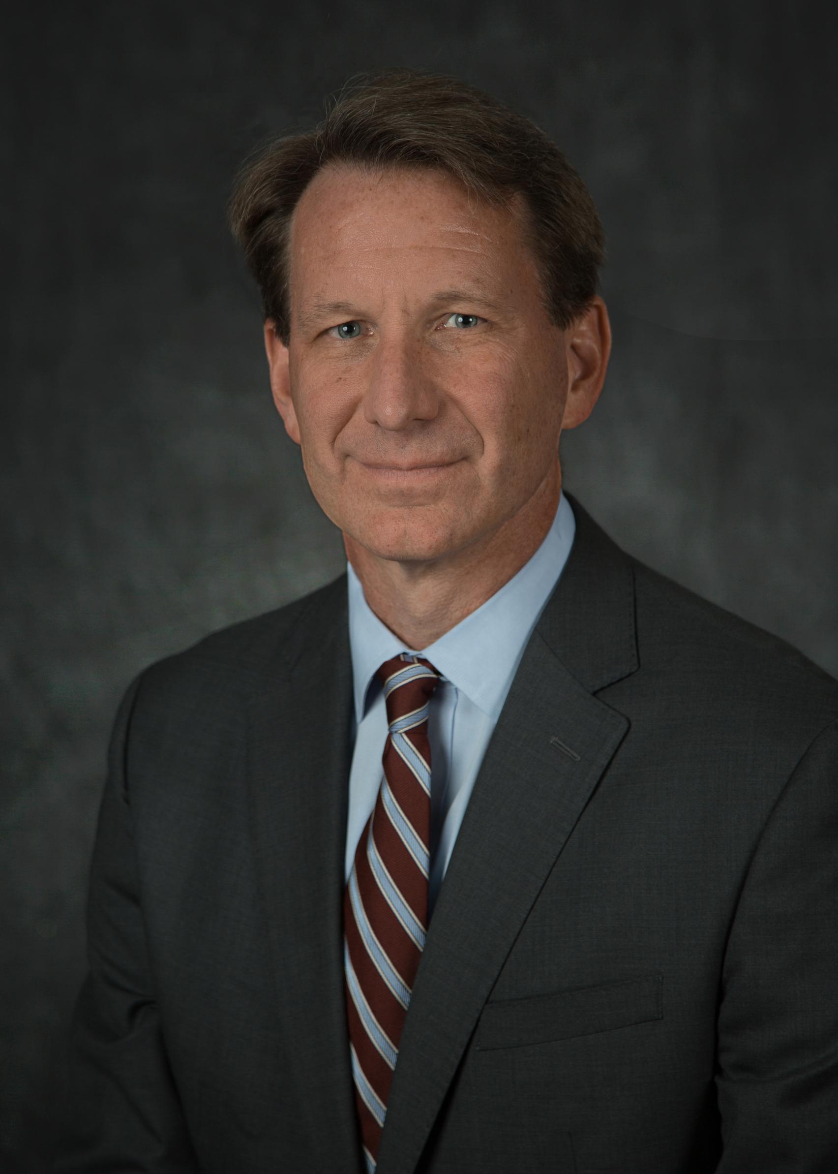 Norman E. Sharpless, M.D.